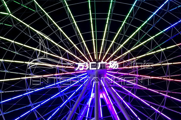 big Ferris wheel with LED lights at night