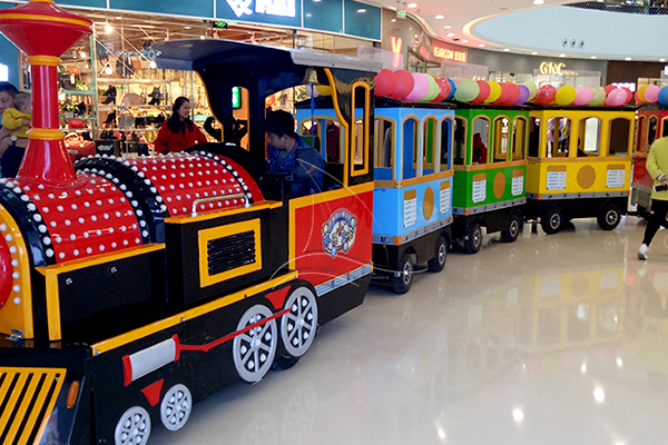 colorful semi-closed diesel train ride for mall