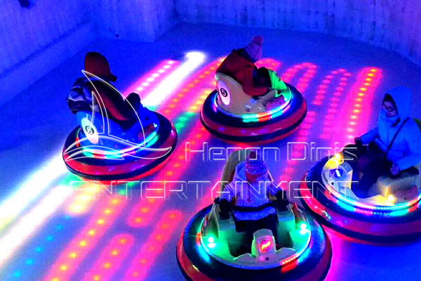 kids round colorful bumper car on ice