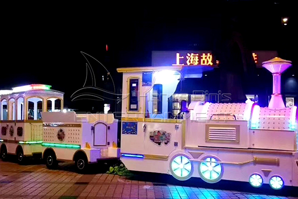 tourist train with shining lights